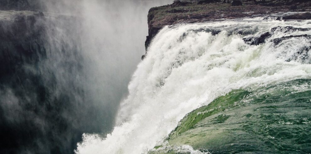 Stunning photo capturing the powerful flow and grandeur of Victoria Falls, Zimbabwe.